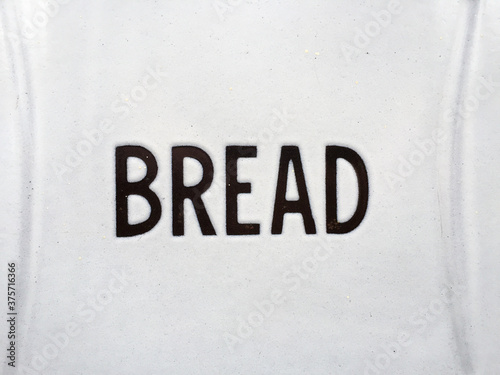 Bread Word on a Withe Metal Surface