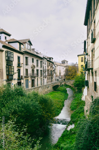 Darro river bridge by Granada town photo