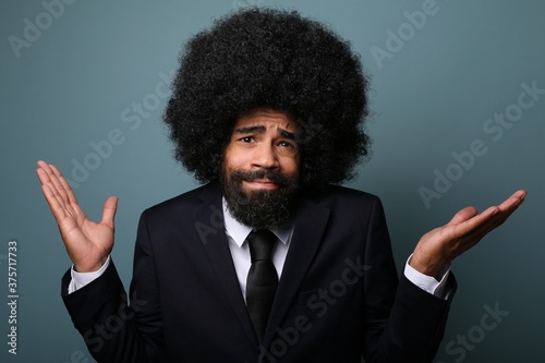 Beautiful afro man in front of a background