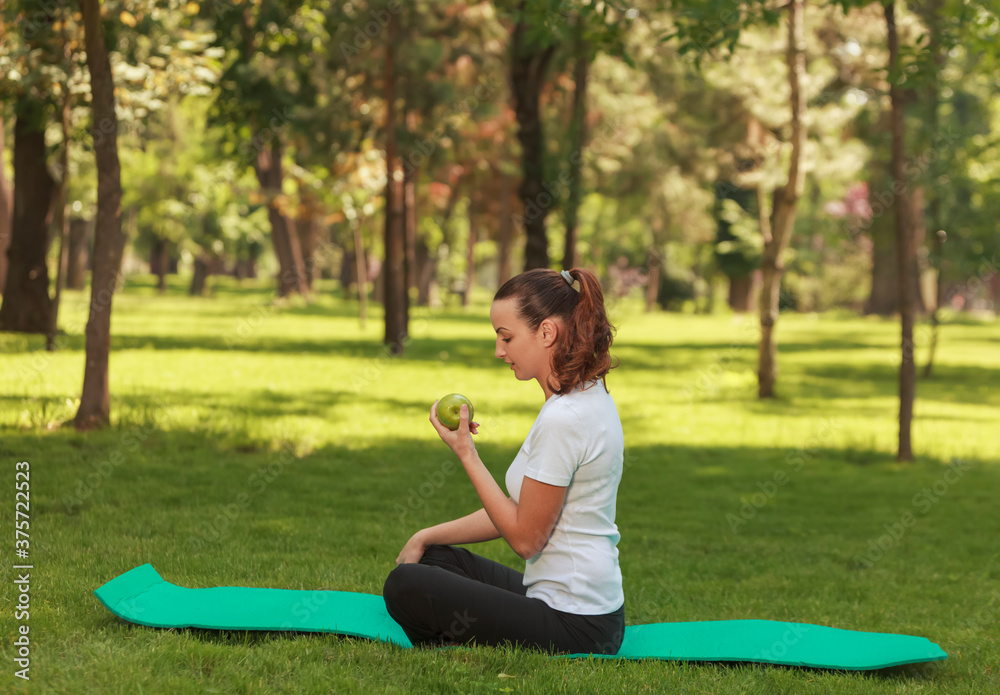 Woman Relaxing in a Park Woman Relaxing in a Park