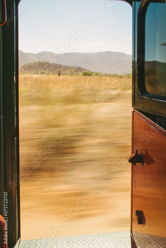 Open train door during high speed ride photo