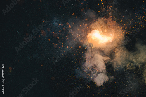 Exploding green firecracker