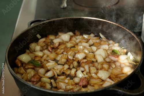 Close up fried onions and garlic nicely browned photo