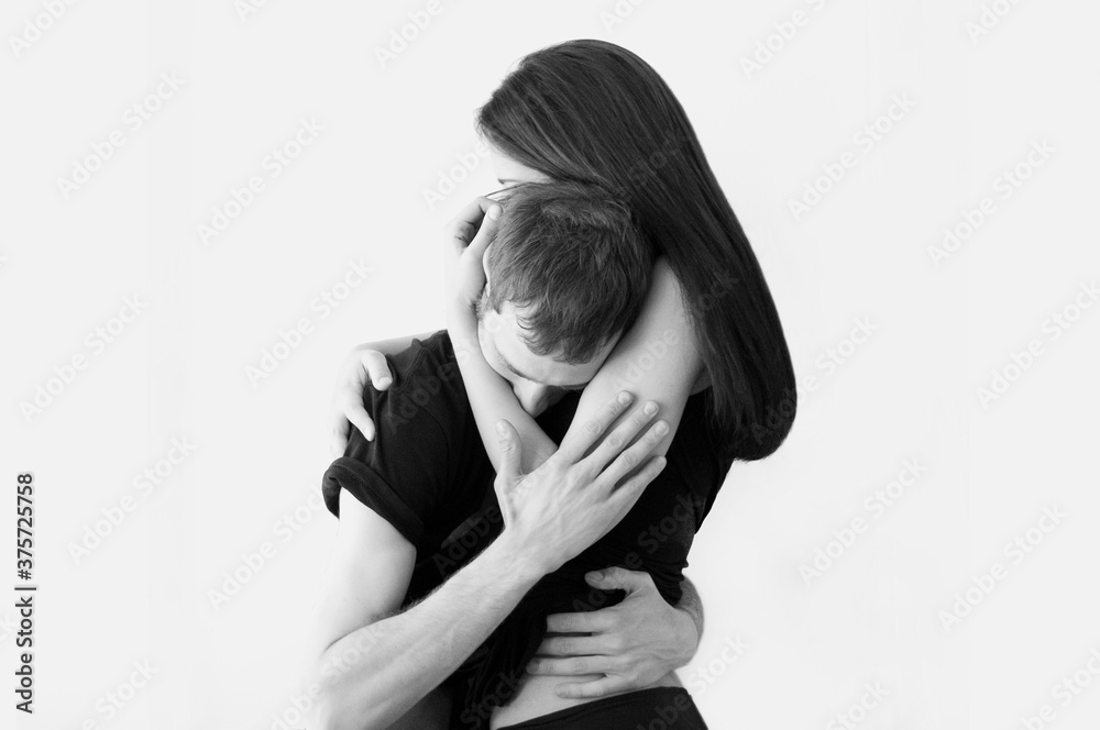 romantic couple hugging in black and white