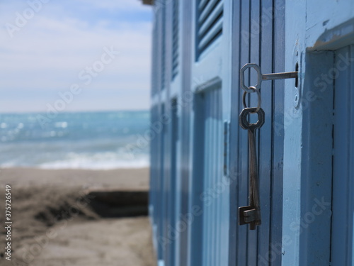 key lock beach sand ocean photo