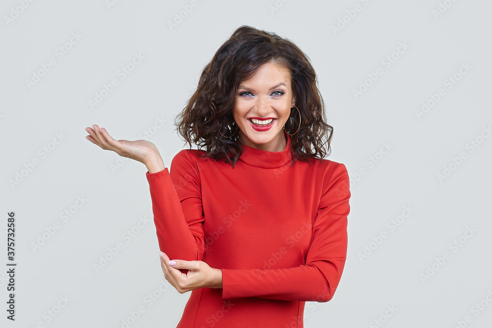 attractive girl in a red dress. the concept of advertising attractive girl in a red dress. the concept of advertising