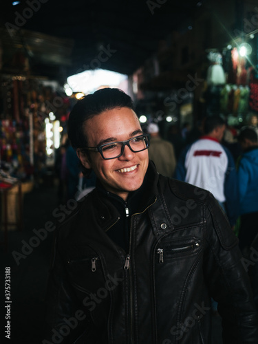 Moroccan man smiling in marakesh city photo