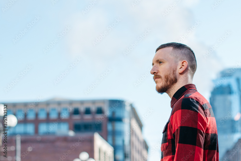 Portraits of a young man in urban city area
