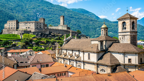 Scenic cityscape of Bellinzona with Castelgrande castle and Chiesa Collegiata dei Santi Pietro e Stefano church Ticino Switzerland