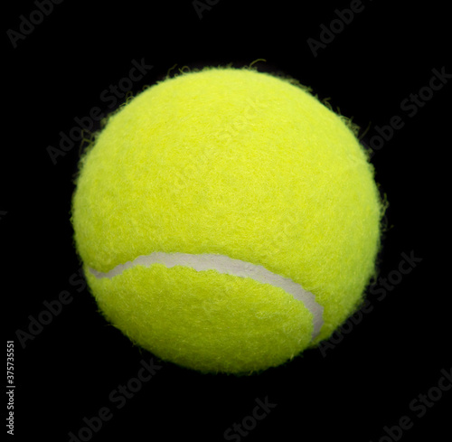 Bright tennis ball isolated on background. © Prikhodko