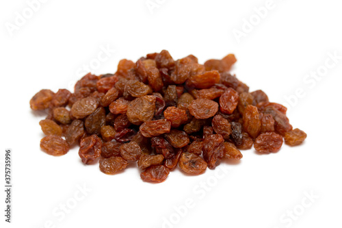 Dried grapes, on a white background.