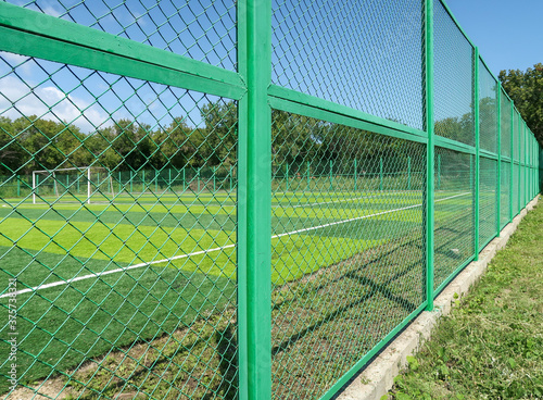 Mesh fence in the football field.