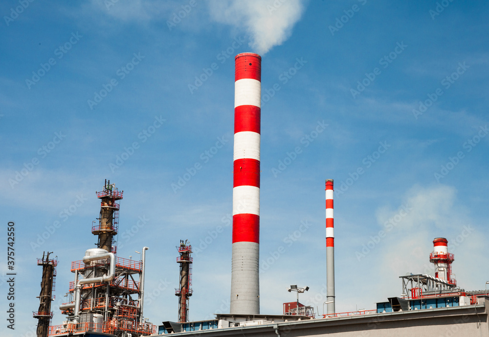 Modern industry complex with power station and environmental pollution / oil refinery Modern industry complex with power station and environmental pollution / oil refinery