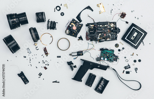 Super 8 movie camera stripped down in parts. photo