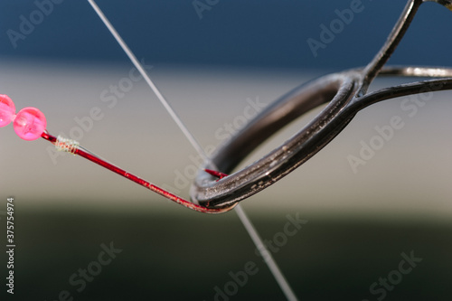 close up of fishing line and hook in ferrule