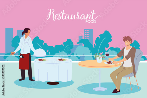 man dining in restaurant and waiter serving the table