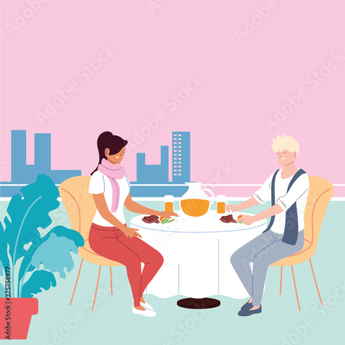 couple in love having dinner and having a juice in the restaurant