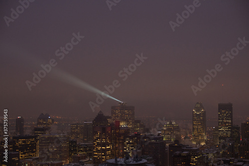 Building searchlight at night photo