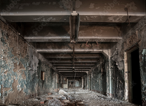 old abandoned burn corridor on the russian factory photo