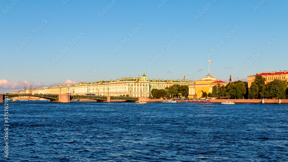 Winter Palace on the embankment of Neva river and Palace bridge in Saint Petersburg, Russia.