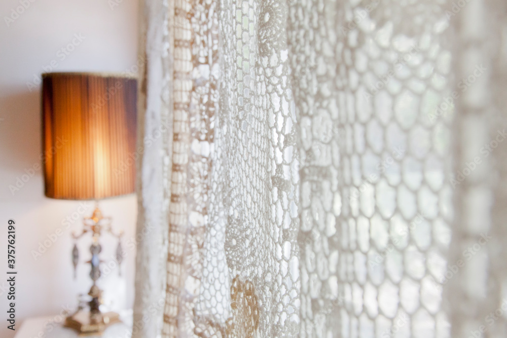 Lamp and crochet drapes Lamp and crochet drapes