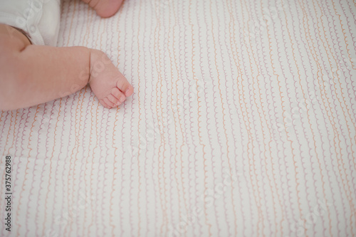 cute baby foot in crib