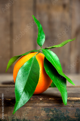 Fresh orange with leaves