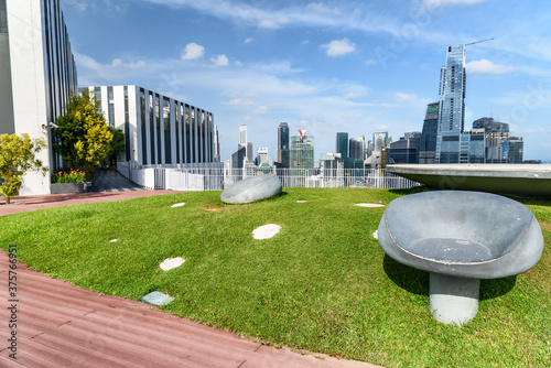 Rooftop park in Singapore. Scenic outside terrace with garden photo