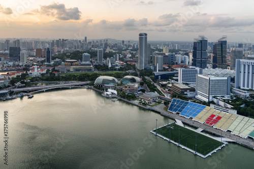 Unusual aerial view of Singapore at sunset. Marina Bay Area