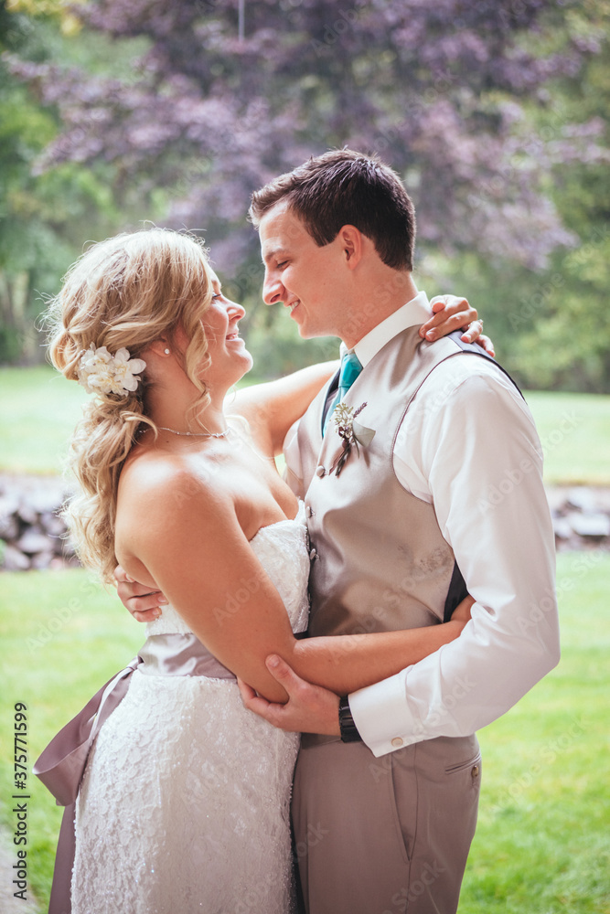 Bride and Groom looking at each other on Wedding day Bride and Groom looking at each other on Wedding day