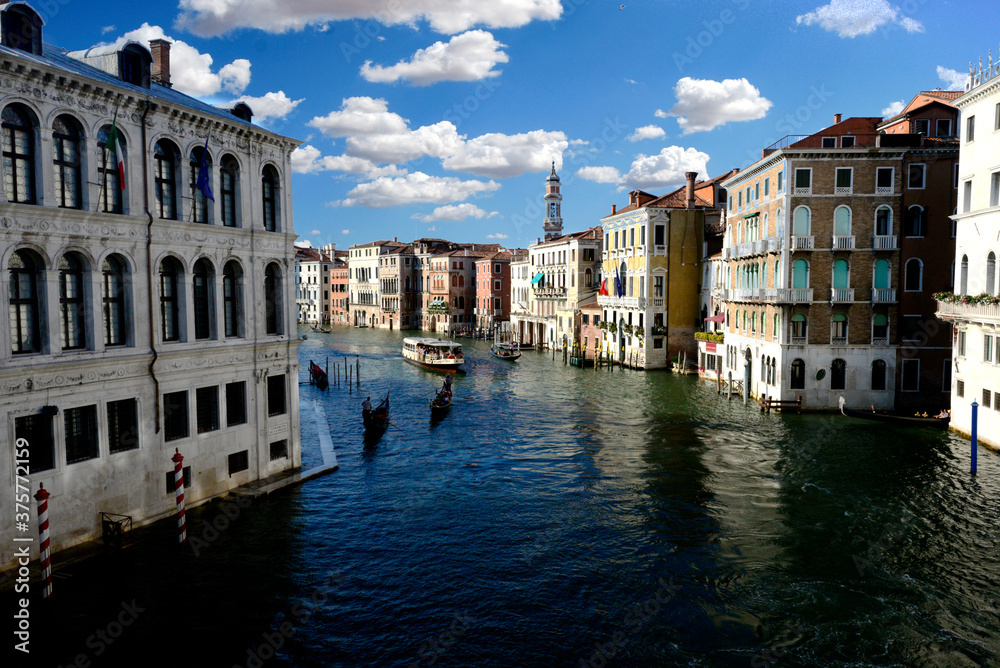 Naklejka premium grand canal in Venice with blue sky and white clouds