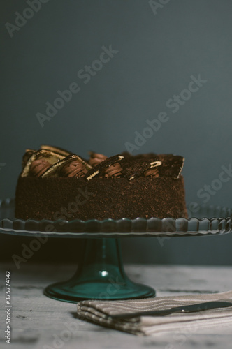 Delicious chocolate cake on the glass dish photo