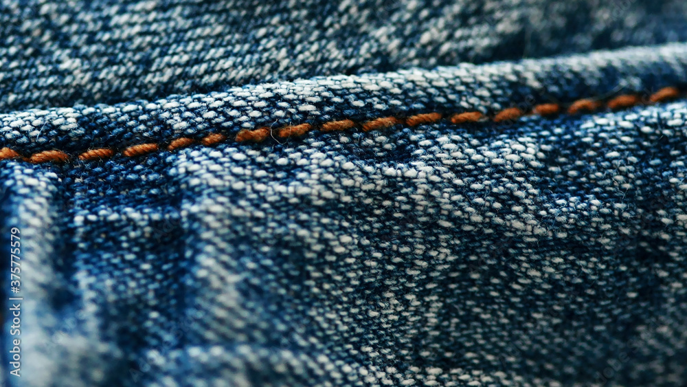Jeans denim texture close up , focus only one point , soft blured background wallpaper Jeans denim texture close up , focus only one point , soft blured background wallpaper