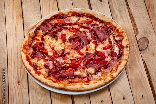 pizza on the wooden background