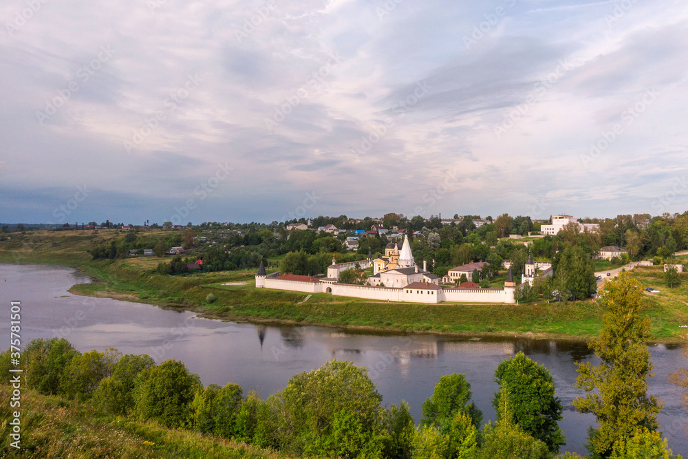 Picturesque view of small ancient town Staritsa with Staritskiy Holy Dormition Monastery on the Volga River in Russia.