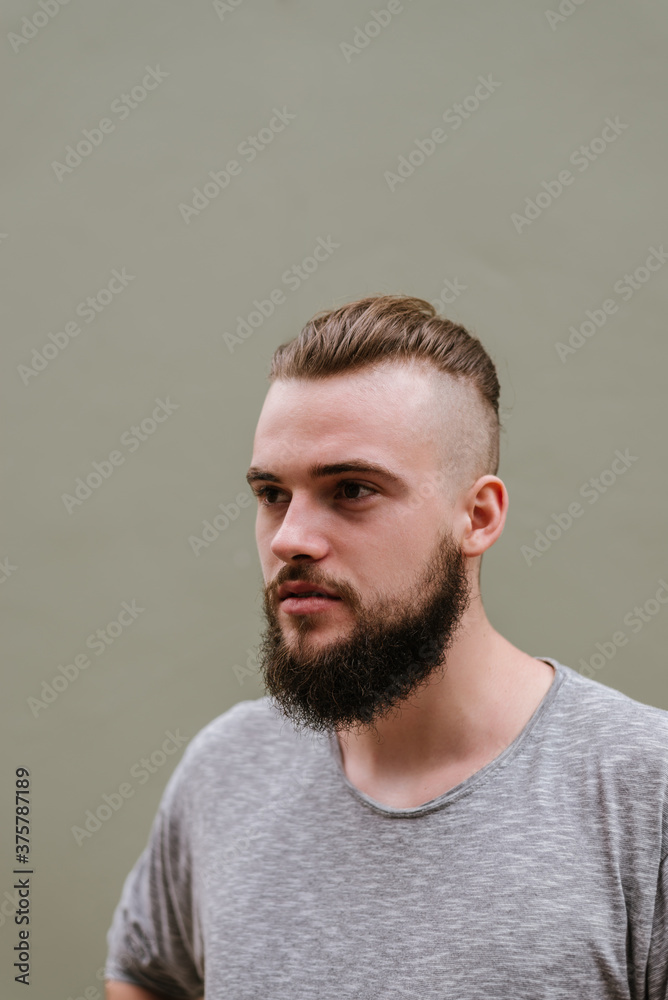 Portrait of a young bearded man Portrait of a young bearded man