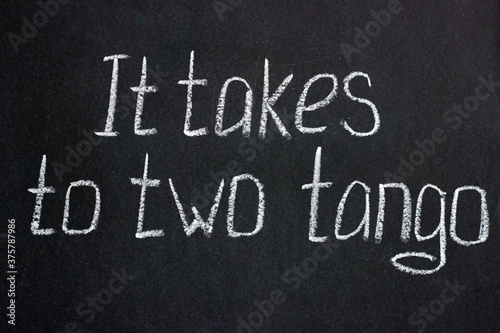 Quadro su tela Chalkboard lettering It take two tango. Common phrase