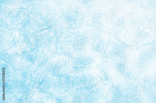 Frost texture iced surface - Winter material. Texture of ice. Snow texture. The surface of the earth is covered with snow. Cracked ice background. Abstract frozen water.Ice texture winter background.