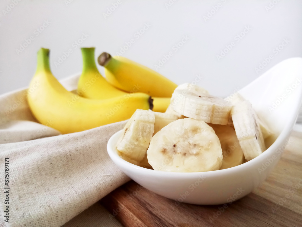 fresh bananas on wooden table. fresh bananas on wooden table.