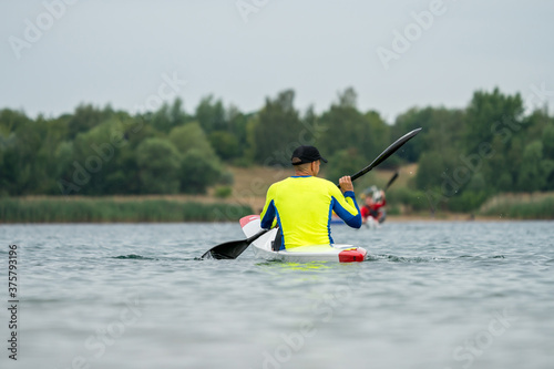 Man in a kayak on a lake