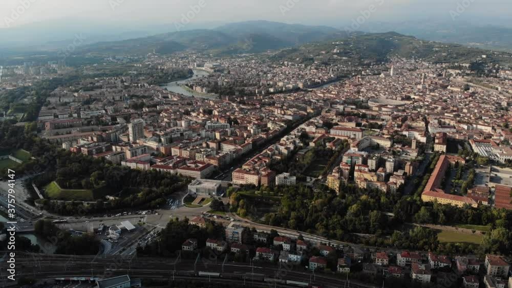 Aerial view of a historic city located on the river. Tourist Italy and destinations. Aerial view of a historic city located on the river. Tourist Italy and destinations.