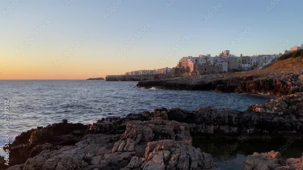 Video of the sunrise of Polignano a mare, Puglia, Italy. Cliff overlooking the sea Video of the sunrise of Polignano a mare, Puglia, Italy. Cliff overlooking the sea