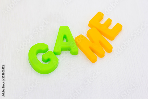 Wallpaper Mural Kids plastic toy colorful letters on white background, Phrase game. Learning english words in language school Torontodigital.ca