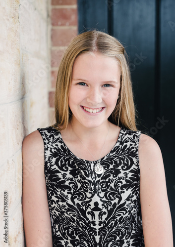teenager portrait, smiling to camera