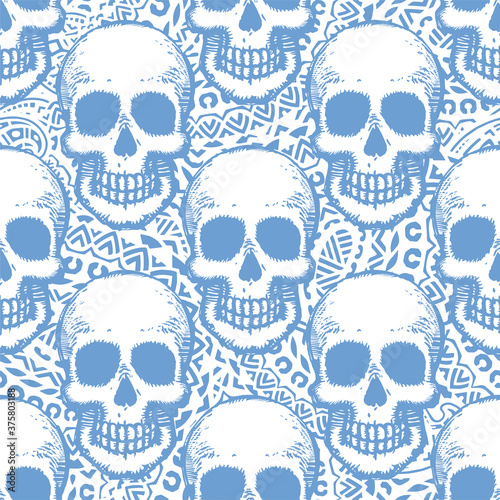 Seamless pattern with hand drawn skulls. Vector Illustration