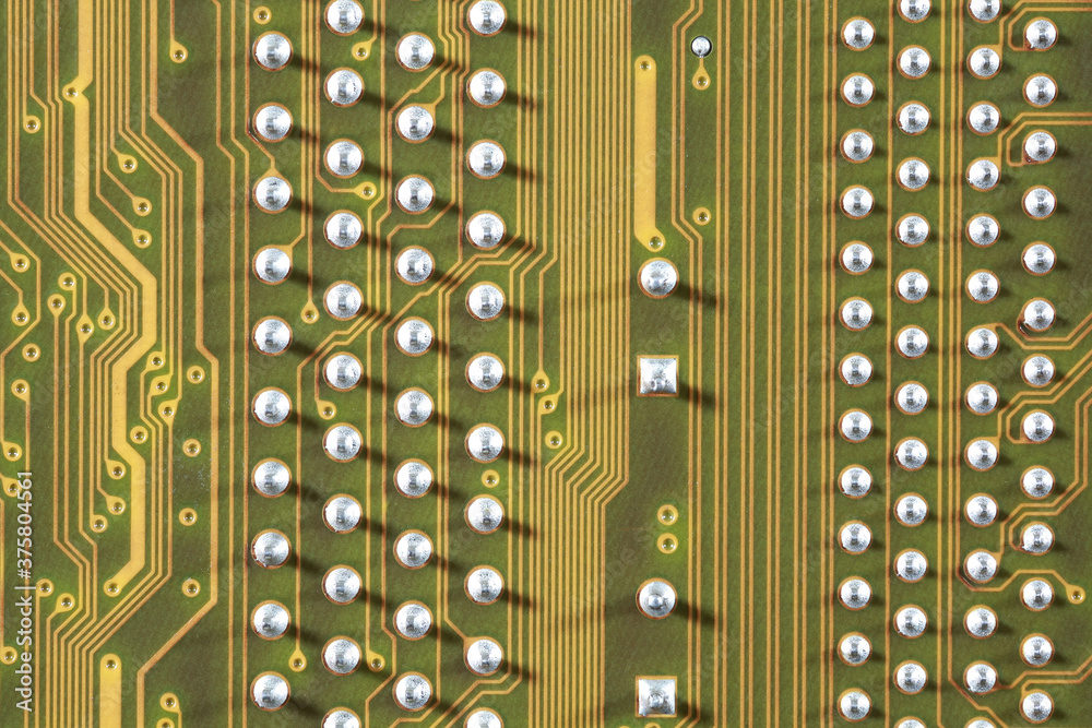 © Wenhai Tang/Stocksy - close-up of electronic circuit golden board background of computer motherboard. © Wenhai Tang/Stocksy - close-up of electronic circuit golden board background of computer motherboard.