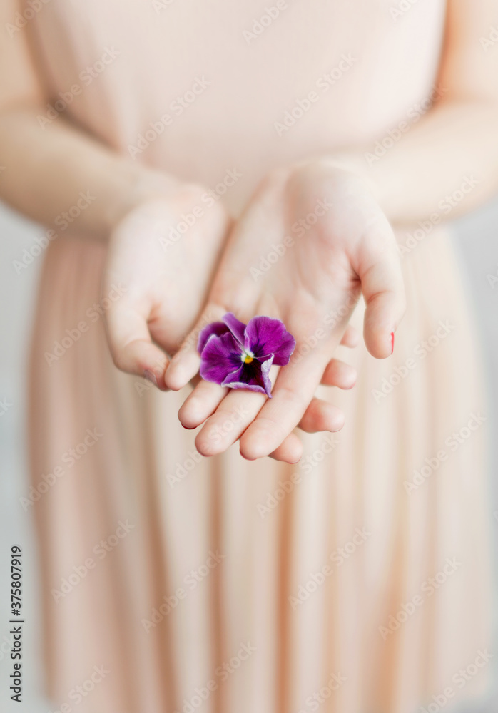 Woman holding Bud Woman holding Bud
