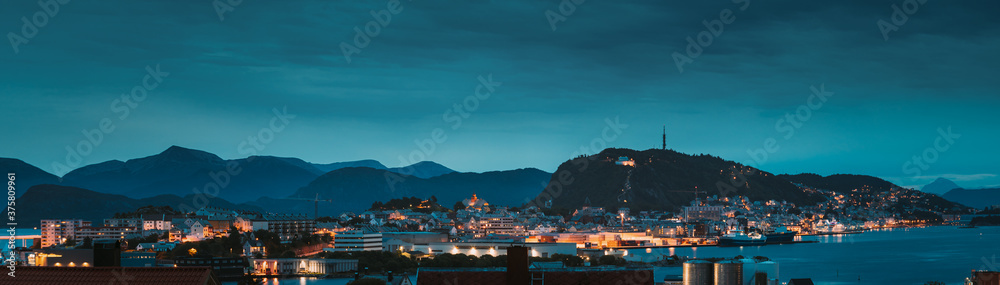 Alesund, Norway. Night Alesund Skyline Cityscape. Historical Center In Summer Evening. Famous Norwegian Landmark And Popular Destination. Alesund, Kiven viewpoint, Mt. Panorama Panoramic View.