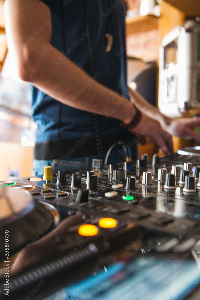 DJ plays at home