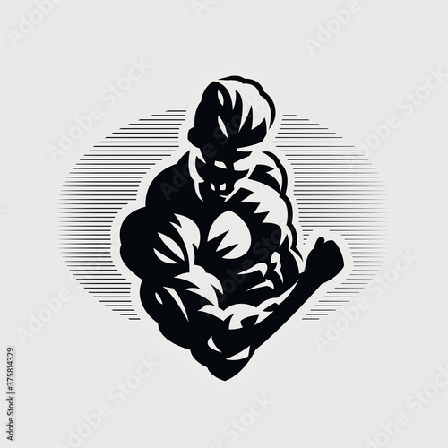 Slika na platnu Muscular man squeezes his biceps.
